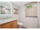 Cozy bathroom featuring a granite countertop, wood accents, and an efficient toilet at 1255 Cold Harbor Dr, Roswell, GA 30075