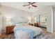 Well-lit bedroom with hardwood floors, mirrored closet, and neutral tones at 1255 Cold Harbor Dr, Roswell, GA 30075
