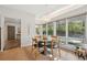 Bright breakfast nook with wooded views featuring a round table and modern pendant lighting at 1255 Cold Harbor Dr, Roswell, GA 30075