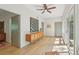 Hallway with bright natural light, hardwood flooring, and modern accents at 1255 Cold Harbor Dr, Roswell, GA 30075