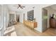 Light-filled hallway with hardwood floors, ceiling fan, and modern decor at 1255 Cold Harbor Dr, Roswell, GA 30075