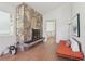 Cozy living room with stone fireplace and hardwood flooring at 1255 Cold Harbor Dr, Roswell, GA 30075