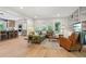 Bright living room features hardwood floors, large windows, and a built-in bookcase at 1255 Cold Harbor Dr, Roswell, GA 30075