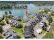 Magnificent aerial view of the townhome community, highlighting the lakefront setting and numerous boat slips at 14020 Tributary Ln, Villa Rica, GA 30180