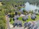 Lakefront community boasts luxury living with lake views, boat docks, and well-maintained landscaping at 14020 Tributary Ln, Villa Rica, GA 30180