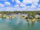 Aerial view of lakefront community with docks and boat slips showcasing prime waterfront living at 14020 Tributary Ln, Villa Rica, GA 30180