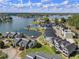 Gorgeous aerial view of waterfront community homes along the shores of Lake Norman at 14020 Tributary Ln, Villa Rica, GA 30180