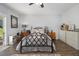 Spacious bedroom with a sliding glass door that provides a view of the outdoors and access to natural light at 14020 Tributary Ln, Villa Rica, GA 30180