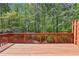 Wood deck offering green views of a backyard forest at 1429 Ferocity Ridge Nw Way # 12, Kennesaw, GA 30152