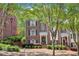 Charming brick townhome with manicured landscaping and inviting front entrance at 1429 Ferocity Ridge Nw Way # 12, Kennesaw, GA 30152