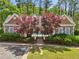 Community pool featuring mature landscaping and covered picnic area at 1429 Ferocity Ridge Nw Way # 12, Kennesaw, GA 30152
