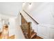 Beautiful hardwood staircase with decorative iron and wood railing at 1429 Ferocity Ridge Nw Way # 12, Kennesaw, GA 30152