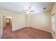 Bedroom featuring carpet, natural light, a ceiling fan, and a doorway at 3155 Boldmere Se Trl # 3, Smyrna, GA 30080