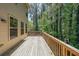 Wooden deck with railing, overlooking green wooded area at 3155 Boldmere Se Trl # 3, Smyrna, GA 30080