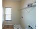 Laundry room with a window, utility shelf, and hookups for a washer and dryer at 3155 Boldmere Se Trl # 3, Smyrna, GA 30080