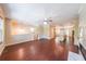 Spacious living room featuring hardwood floors, a ceiling fan, and an open floor plan into the kitchen at 3155 Boldmere Se Trl # 3, Smyrna, GA 30080