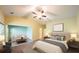 Spacious bedroom with vaulted ceiling features sitting area and modern ceiling fan at 3155 Boldmere Se Trl # 3, Smyrna, GA 30080
