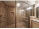 Shower featuring tiled walls, a glass door, a bench, and multiple shower heads at 3155 Boldmere Se Trl # 3, Smyrna, GA 30080