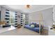Charming bedroom featuring a playhouse-style bed, blue accents, and a basketball hoop at 100 Coldwater Creek Dr, Mcdonough, GA 30252