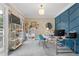 Modern home office with custom wall, stylish furnishings, and ample natural light for a productive workspace at 100 Coldwater Creek Dr, Mcdonough, GA 30252