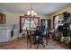 Dining area features a wood table set and is adjacent to laundry area at 1001 Rhett Nw Dr, Kennesaw, GA 30144
