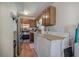 Galley kitchen showcases stainless steel appliances and light countertops at 1001 Rhett Nw Dr, Kennesaw, GA 30144