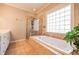 A luxurious bathroom showcasing a tub and glass shower at 414 Pensdale Rd, Decatur, GA 30030
