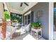 Relaxing front porch with swing and cozy seating area at 414 Pensdale Rd, Decatur, GA 30030