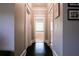 Hallway with hardwood floors leading to a bathroom at 414 Pensdale Rd, Decatur, GA 30030