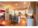 Modern kitchen with stainless steel appliances, granite countertops, and a functional island at 414 Pensdale Rd, Decatur, GA 30030