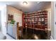 Cozy library features custom bookshelves, hardwood floors, and natural light at 414 Pensdale Rd, Decatur, GA 30030