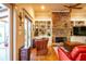 Living room with a stone fireplace, built-in bookshelves, and comfortable seating at 414 Pensdale Rd, Decatur, GA 30030