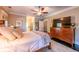 Spacious main bedroom with dark wood floors and a ceiling fan at 414 Pensdale Rd, Decatur, GA 30030
