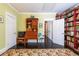 Spacious home office with built-in bookshelves and a vintage desk at 414 Pensdale Rd, Decatur, GA 30030