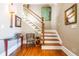 Elegant staircase with hardwood treads and white risers at 414 Pensdale Rd, Decatur, GA 30030