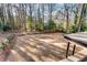 Large backyard features mature trees and greenery, creating a serene outdoor space at 4366 Skyland Ne Dr, Atlanta, GA 30342