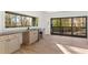 Basement bar area features custom cabinets, stone countertops, and a wine fridge at 4366 Skyland Ne Dr, Atlanta, GA 30342