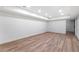 Spacious basement with wood-look flooring and recessed lighting at 4366 Skyland Ne Dr, Atlanta, GA 30342