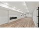 Finished basement with a modern fireplace, recessed lighting, and a sleek, minimalist design at 4366 Skyland Ne Dr, Atlanta, GA 30342