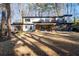 Stunning modern home with large windows and deck space surrounded by a wooded lot at 4366 Skyland Ne Dr, Atlanta, GA 30342