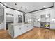 Spacious kitchen with large island, stainless steel appliances, and sleek white cabinetry at 4366 Skyland Ne Dr, Atlanta, GA 30342