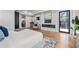 Main bedroom with hardwood floors, modern fireplace, and a stylish ensuite bathroom at 4366 Skyland Ne Dr, Atlanta, GA 30342