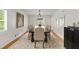 Formal dining room with a large table, elegant chairs, and sophisticated decor at 5040 Winding Branch Dr, Dunwoody, GA 30338