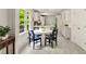 A bright dining area with natural light and stylish decor complements the kitchen at 5040 Winding Branch Dr, Dunwoody, GA 30338