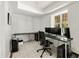 Home office offering ample workspace with a large desk and natural light at 5040 Winding Branch Dr, Dunwoody, GA 30338