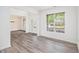 Open floor plan featuring hardwood floors, large windows, and abundant natural light at 881 Springs Crest Dr, Dallas, GA 30157