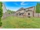 Expansive backyard with wooden fence, providing privacy and security at 900 Fox Croft Pl, Canton, GA 30114