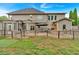 Large backyard featuring a patio with an outdoor kitchen and a well-maintained lawn at 900 Fox Croft Pl, Canton, GA 30114