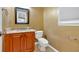 Cozy bathroom with wood cabinets, tile floors and granite countertops at 900 Fox Croft Pl, Canton, GA 30114