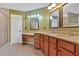 Bathroom features double sinks, vanity, granite countertops, and shower at 900 Fox Croft Pl, Canton, GA 30114